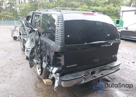 2003 GMC Yukon Sle z USA, uszkodzony, nr VIN 1GKEC13V03J339970